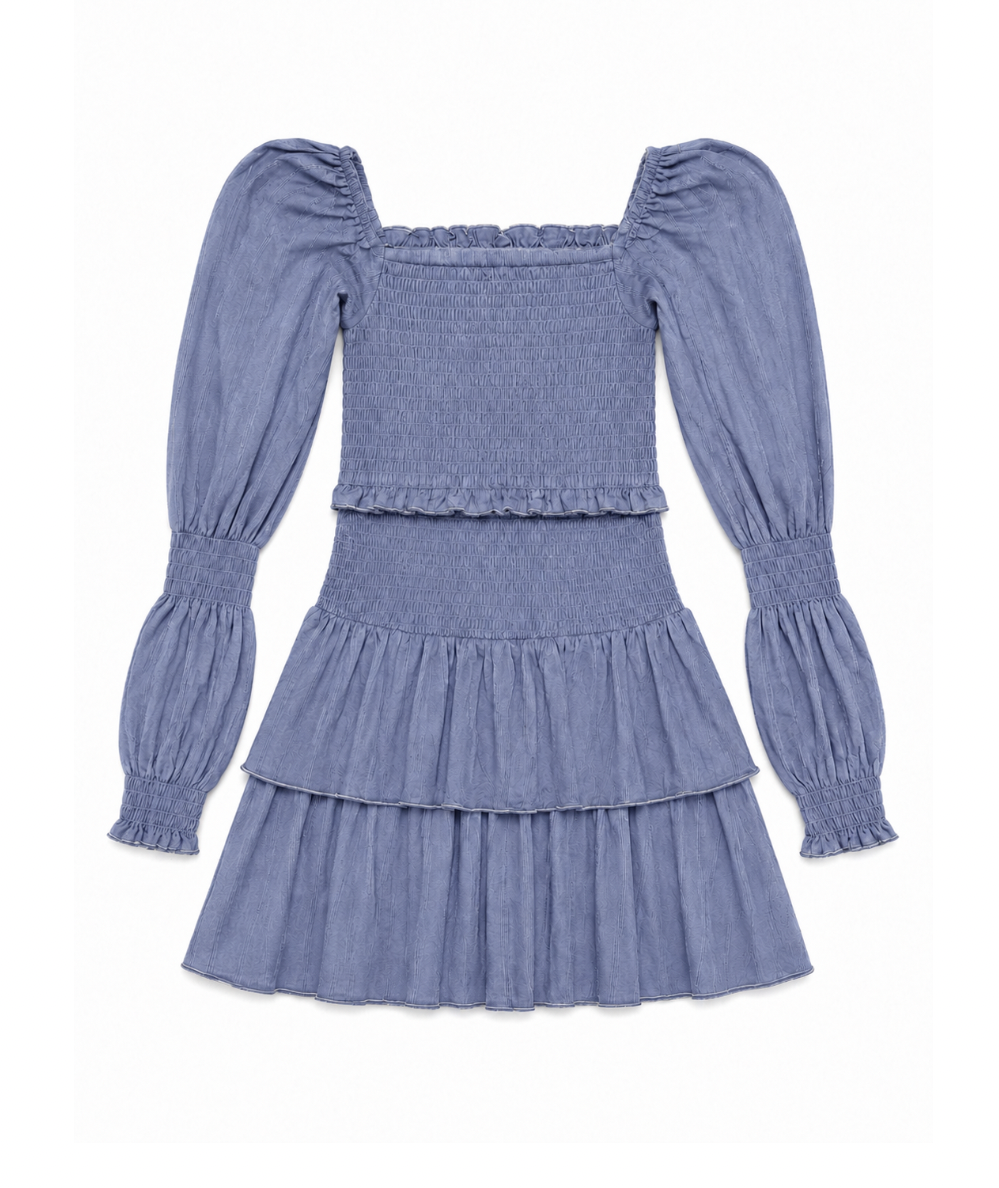 KatieJ NYC Tween Lainey long sleeve smocked dress in Mystic Blue with a square neckline and two-tier ruffle skirt.