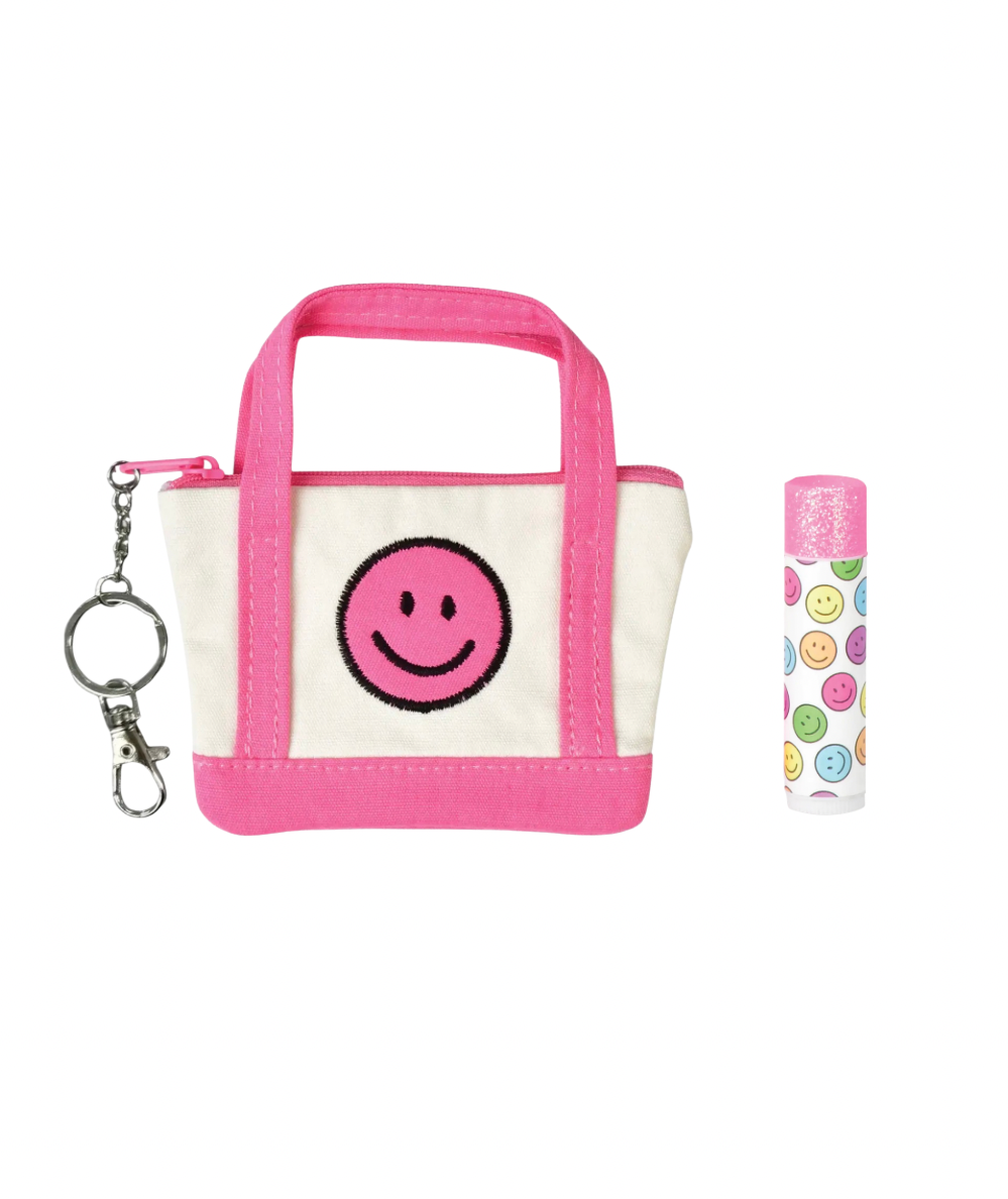 Iscream Smiley Mini Tote Bag keychain with pink trim and colorful smiley lip balm