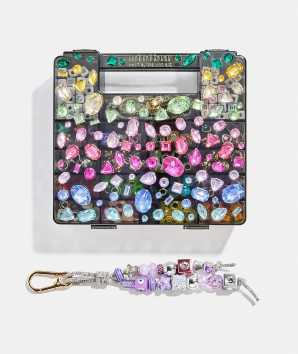 BaubleBar Dream Duo Kids’ DIY bracelet and bag charm kit with gem-covered reusable case In black. 