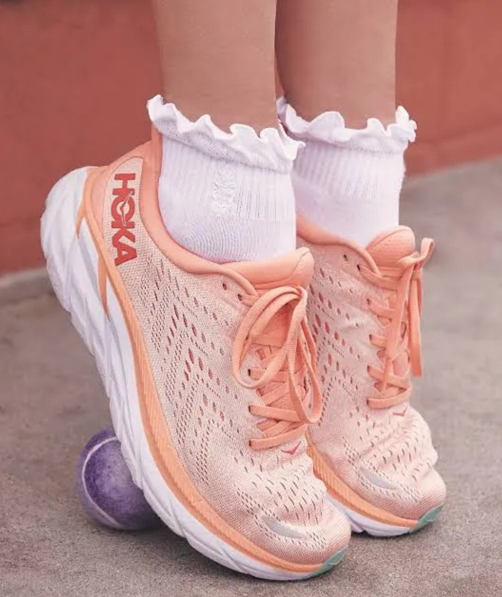 Free People Movement ribbed ankle socks with delicate ruffle-edge detailing and a seamed toe.