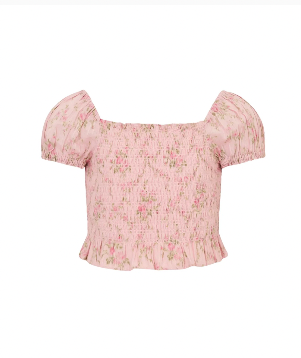 LoveShackFancy Tween Fabielle smocked puff sleeve top in Spiced Camellia floral print with ruffle neckline and peplum hem.