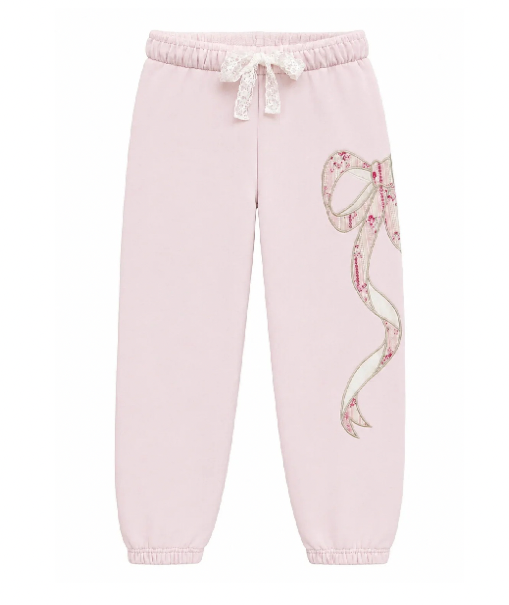 KatieJ NYC Tween Dylan pale pink sweatpants with rose floral bow graphics and a white lace bow waistband.