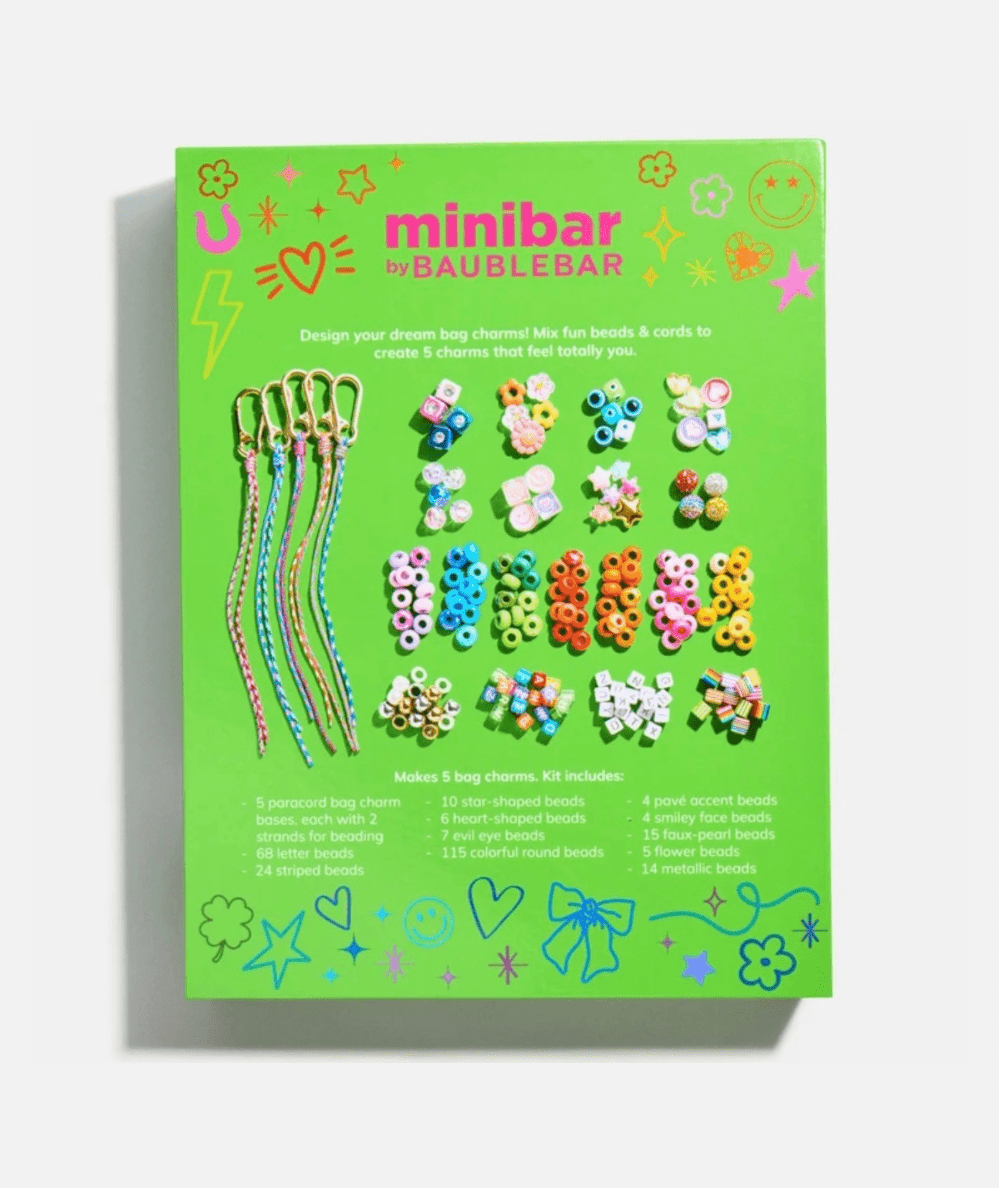 Back of the green BaubleBar bag charm kit box showing paracord bases and bead contents.