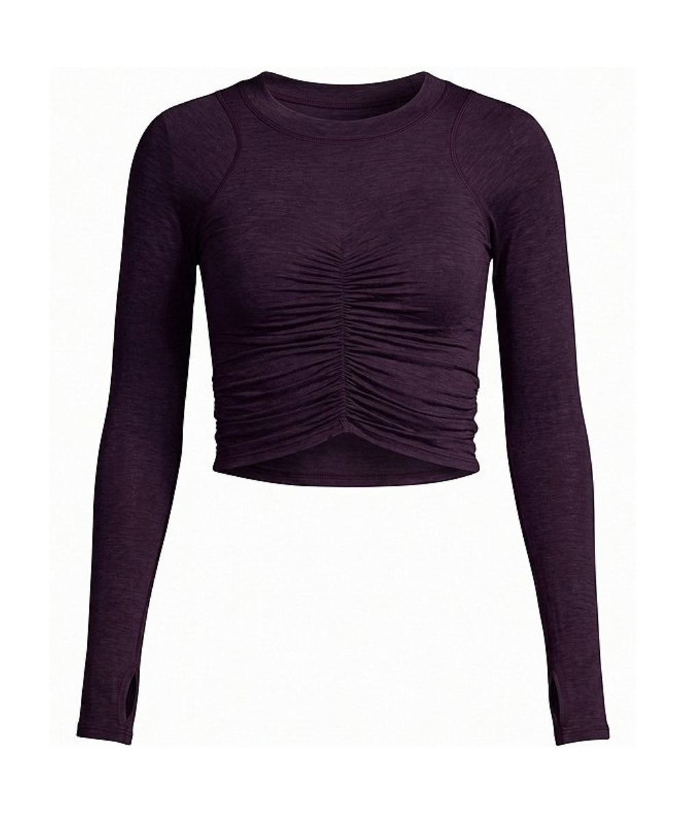 FP Movement Women’s Tempo Ruched Long Sleeve Top in Mars deep plum with front ruching, a cropped hem and thumbholes.