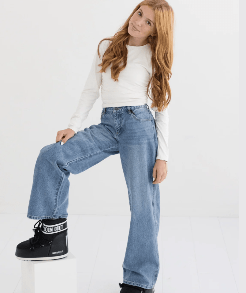 Junior Chicago Low Rise Wide Leg Jean by KatieJ NYC, a trend-forward denim staple - CAKEWISH