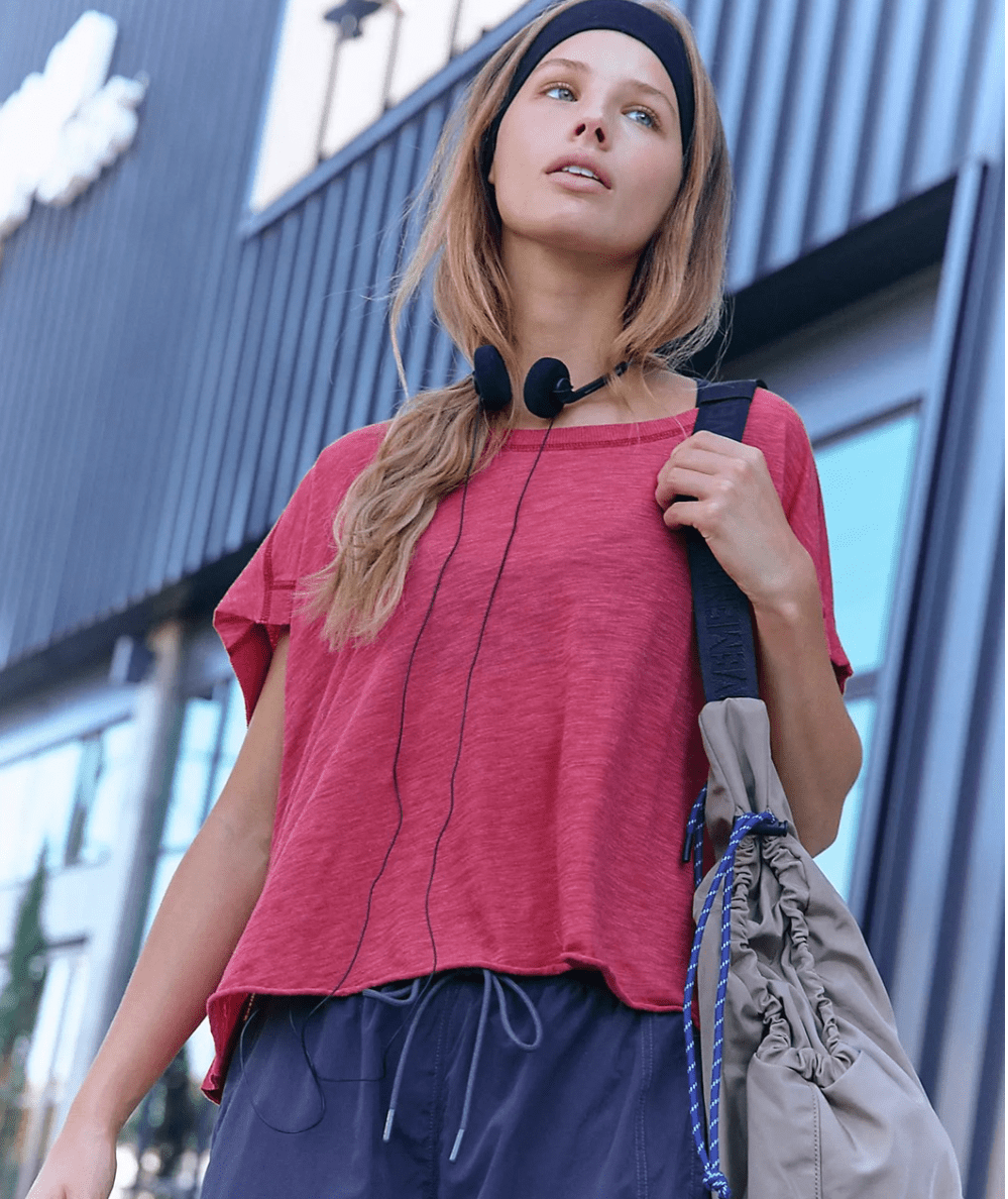 Model in the FP Movement My Time Short Sleeve Tee in Candy Apple - CAKEWISH