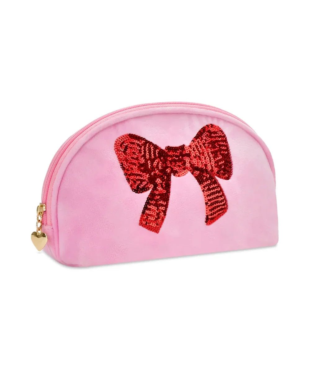 Angled view of the Red Sequins Bow makeup pouch with heart zipper pull by Iscream - CAKEWISH.