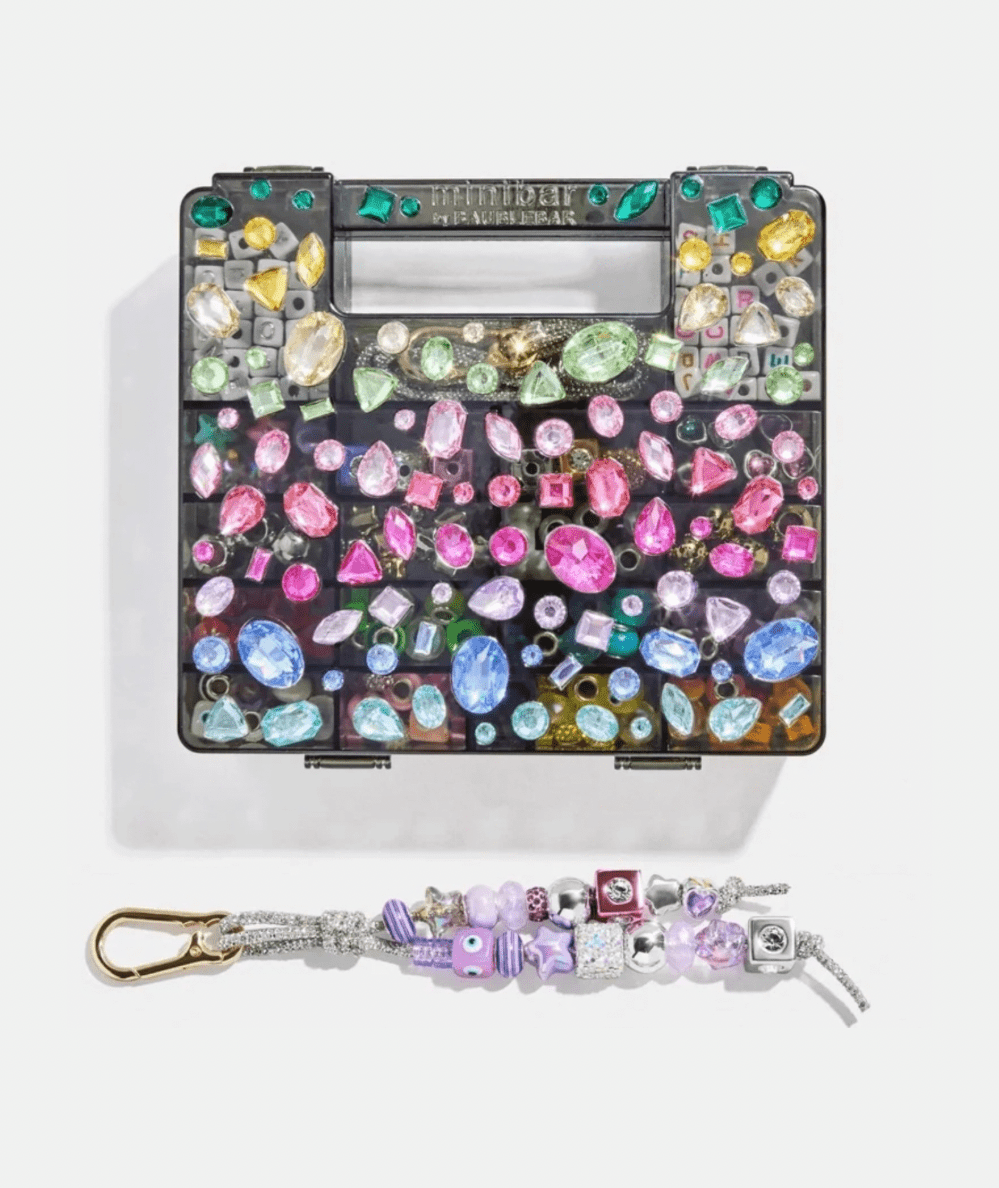 BaubleBar Dream Duo DIY Kit in black with gem beads and a finished beaded bag charm.