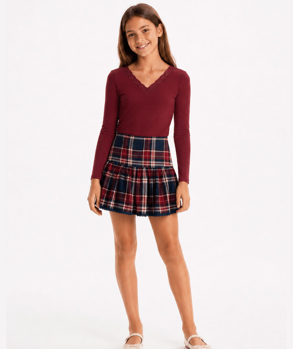 Model wearing the KatieJ NYC Tween Clarke Mini Skirt in navy and burgundy plaid - CAKEWISH