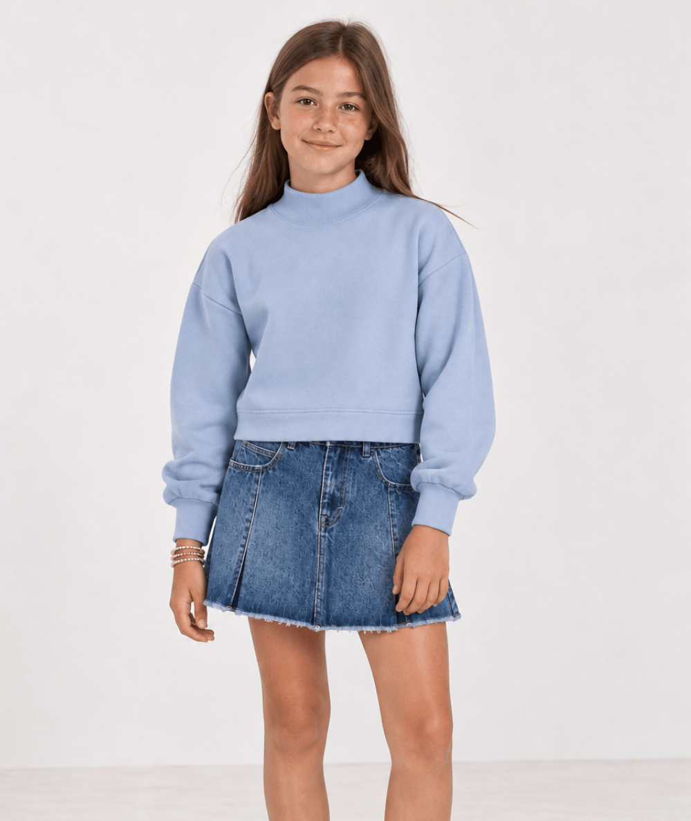 Model wearing the Vintage Havana Tween Mock Neck Weekend Sweatshirt  in Baby Blue- CAKEWISH