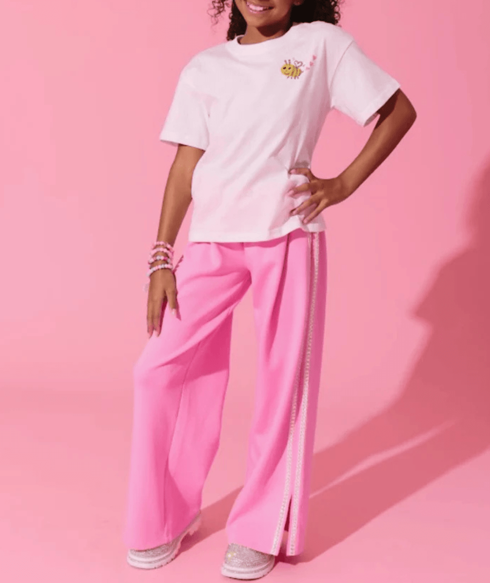 Model wearing the Lola & the Boys Tween Pink Gem Trim Wide leg Sweatpants - CAKEWISH