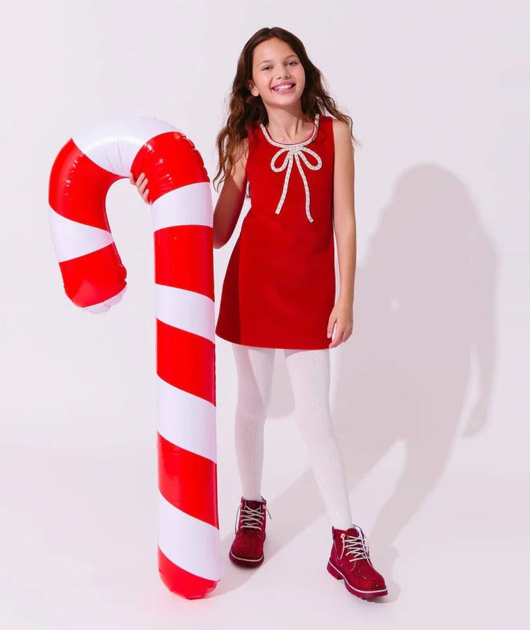 Tween in the Lola and the Boys Red Velvet Bow Princess Dress with a candy cane prop - CAKEWISH