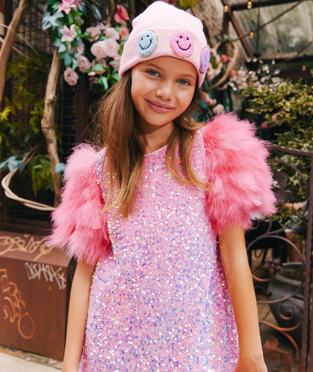 Hot pink feather sleeves on the Tween Rose Feather Party Dress by Lola and the Boys - CAKEWISH