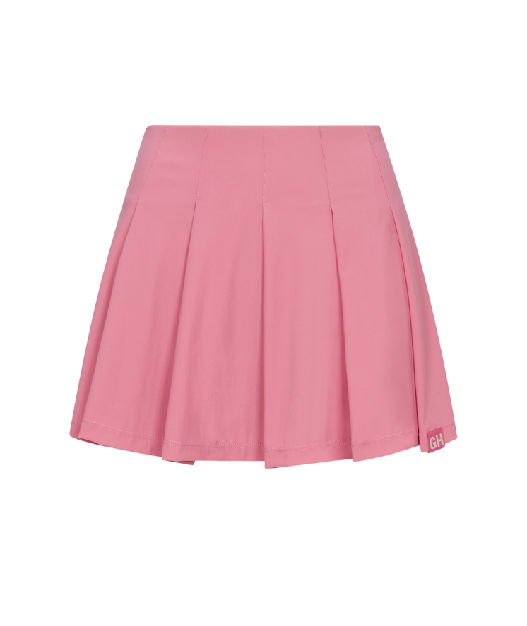 Flat lay of the Desert Rose pink Courtside pleated tennis skirt by Gold Hinge - CAKEWISH.