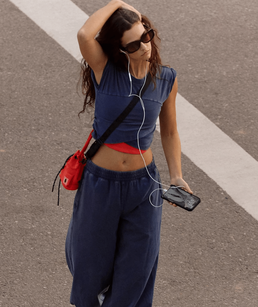 Model in the FP Movement Women's Hot Shot Crossover Set in Eclipse - CAKEWISH